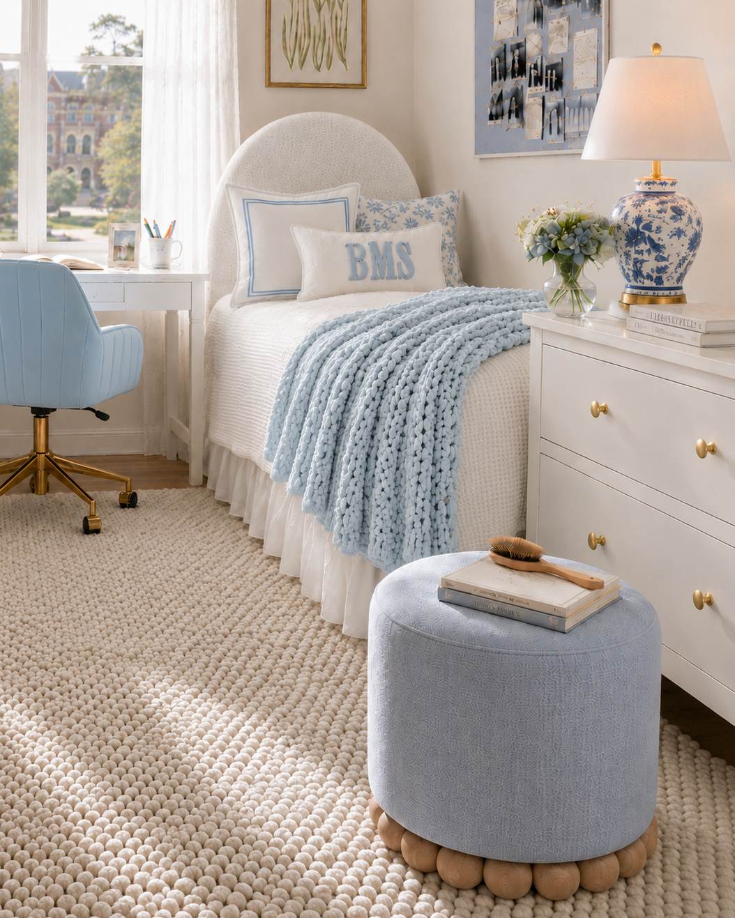 Bluebell Cottage dorm room angle view with soft blue bedding